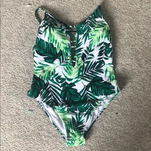 Green leaf patterned one piece bathing suit
